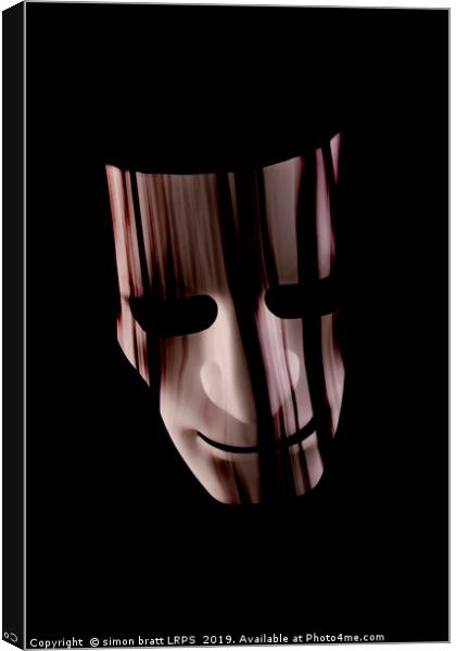Scary face mask with hair over face Canvas Print by Simon Bratt LRPS