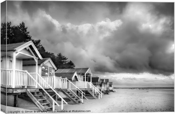 Wells next The Sea Beach huts in black and white on sandy coast Canvas Print by Simon Bratt LRPS