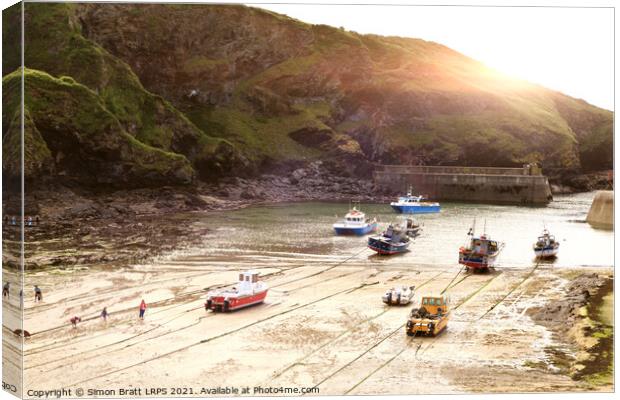 Trawlers in Port Isaac in Cornwall England Canvas Print by Simon Bratt LRPS