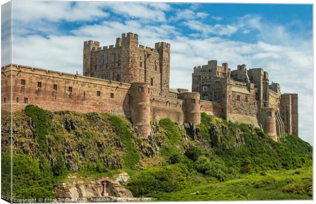 Bamburgh Castle Canvas Print by Ernie Jordan