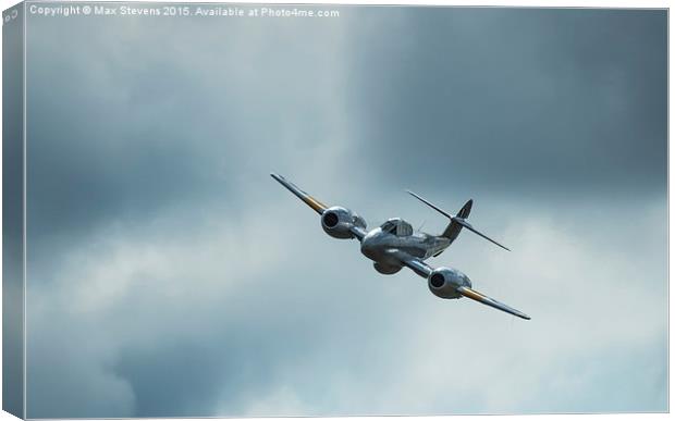  Gloster Meteor comes out of a stormy sky Canvas Print by Max Stevens