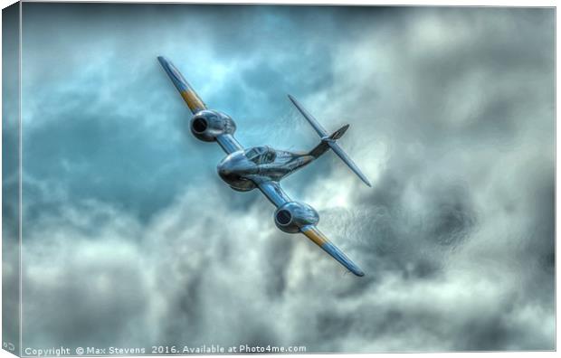 Gloster Meteor comes out of the clouds Canvas Print by Max Stevens
