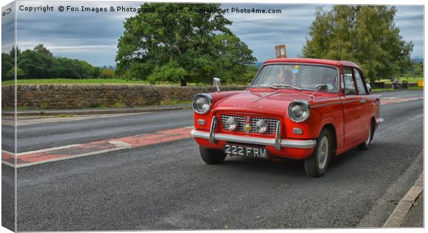 Triumph Herald Canvas Print by Derrick Fox Lomax