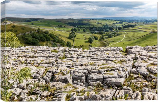  Malham Cove Limestone pavement and Malhamdale Canvas Print by Chris Warham