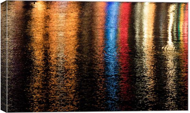 Multicoloured lights refelcted in water  Canvas Print by Chris Warham