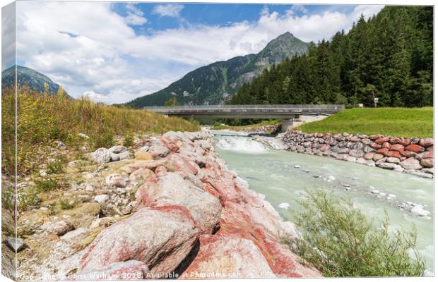 Fast flowing River Arve near Chamonix in the Frenc Canvas Print by Chris Warham