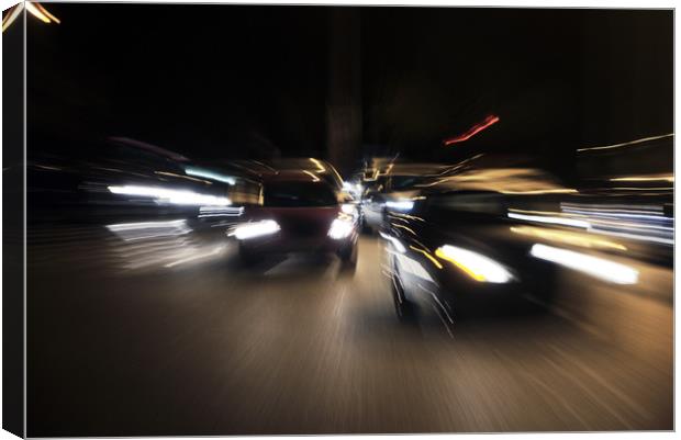 Speed in an urban evening Canvas Print by Jose Manuel Espigares Garc