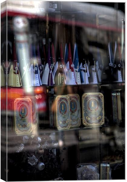 These are reflections on a shop window together wi Canvas Print by Jose Manuel Espigares Garc