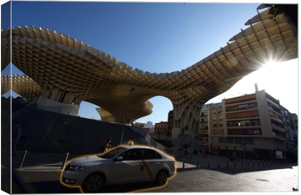 A taxi is passing in front of the so calle «mushro Canvas Print by Jose Manuel Espigares Garc