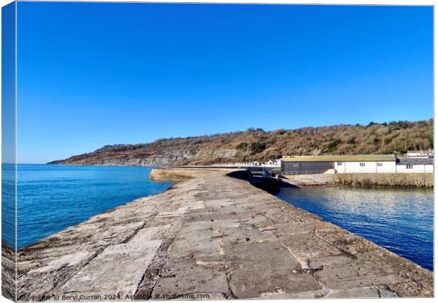 Looking back along the Cobb Wall Lyme Regis Canvas Print by Beryl Curran