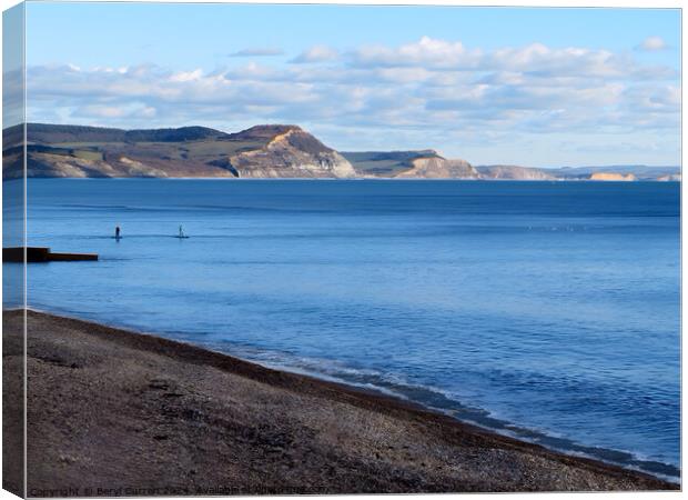 Paddle boarding Lyme Regis Canvas Print by Beryl Curran