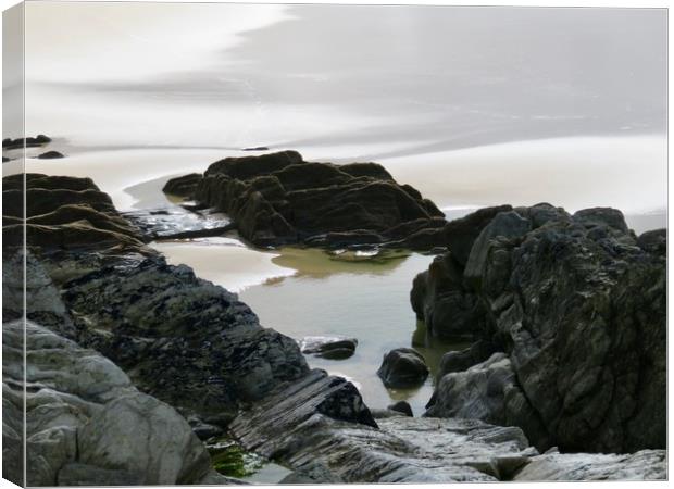 Rocks on beach Woolacombe  Canvas Print by Beryl Curran