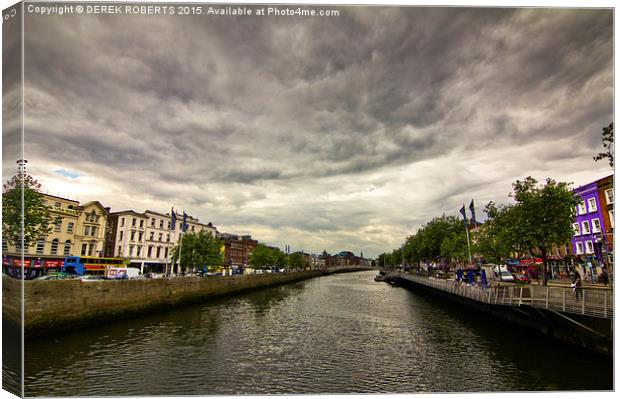 View to the Ha'penny Bridge Dublin on a stormy day Canvas Print by DEREK ROBERTS