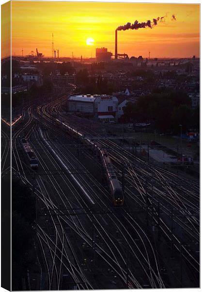 Amsterdam tracks in the sunset Canvas Print by Adam Szuly
