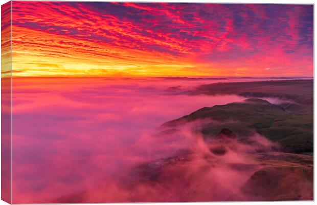 Fire and Fog Canvas Print by John Finney