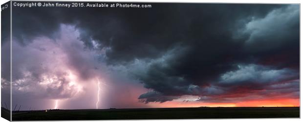 Kansas thunderstorm at sunset, panoramic Canvas Print by John Finney