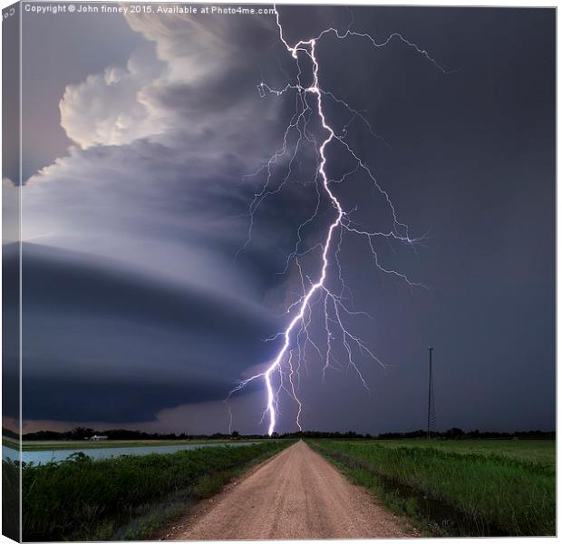  Huge lightning strike over Nebraska, USA.  Canvas Print by John Finney