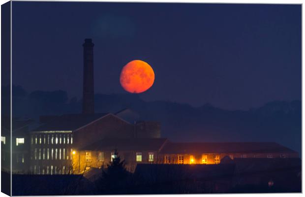 Swizzels Blood moon. New Mills. Derbyshire.  Canvas Print by John Finney