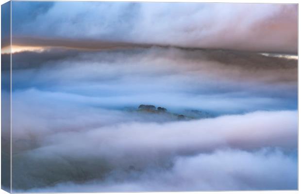Eccles Pike trees above the fog Canvas Print by John Finney