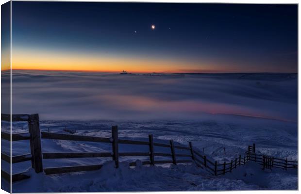 Winter conjunction over freezing fog and snow  Canvas Print by John Finney