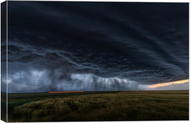Thunderstorm over kansas Canvas Print by John Finney