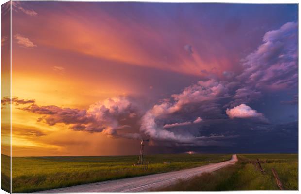 Thunderstorm sunset over Montana Canvas Print by John Finney
