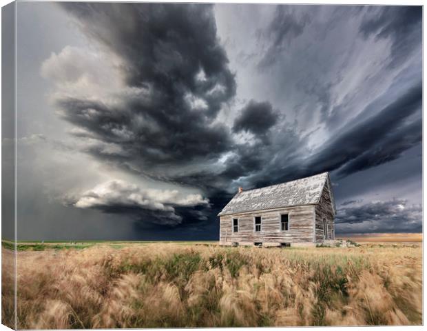 Abandoned Schoolhouse with a Storm, Colorado Canvas Print by John Finney
