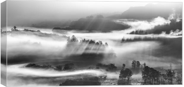 Little Langdale tarn and mist, Cumbria.  Canvas Print by John Finney