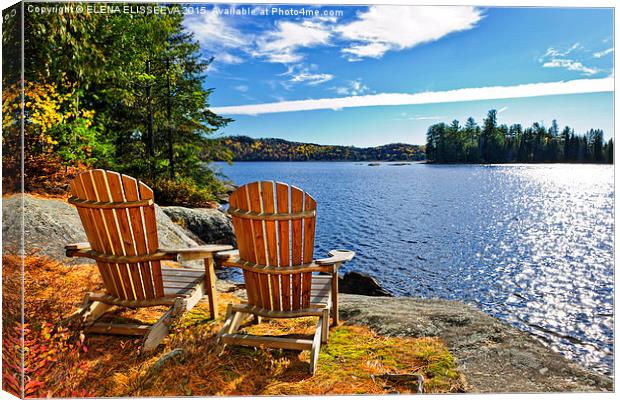 Adirondack chairs at lake shore Canvas Print by ELENA ELISSEEVA