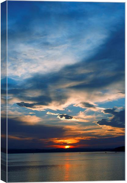 Sunset over lake Canvas Print by Dariusz Miszkiel