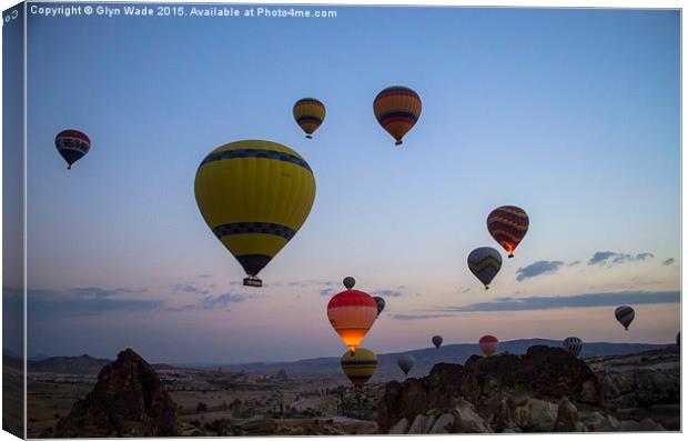  Balloons over Cappadocia Canvas Print by Glyn Wade