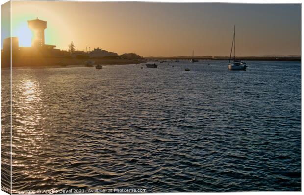 Sunset Time in Faro Island. Algarve Canvas Print by Angelo DeVal