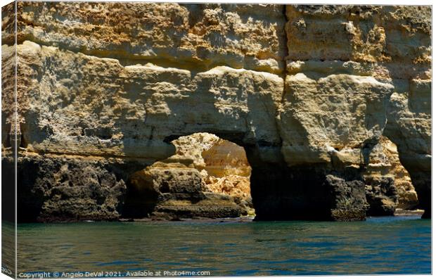 Arches of Marinha Beach and Cliffs Canvas Print by Angelo DeVal
