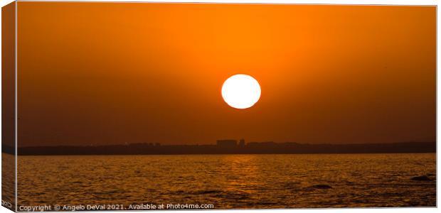Sunset time in Faro Island Canvas Print by Angelo DeVal