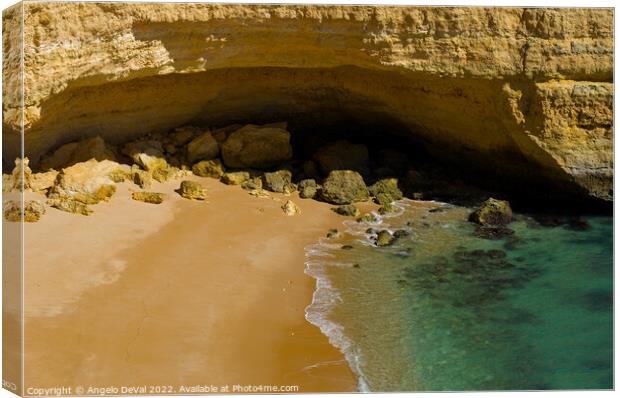 Cliff Cave in Praia Deserta Canvas Print by Angelo DeVal