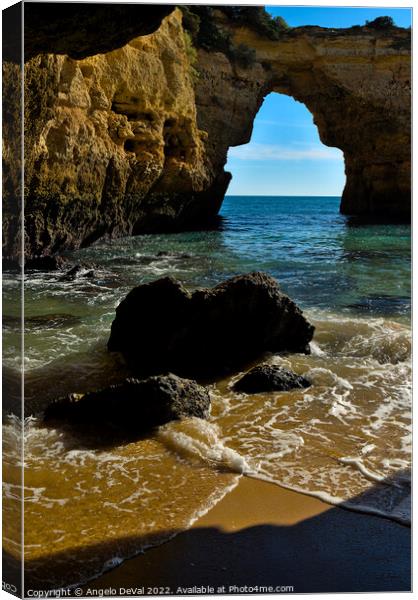 Rocky Arch in Albandeira beach Canvas Print by Angelo DeVal