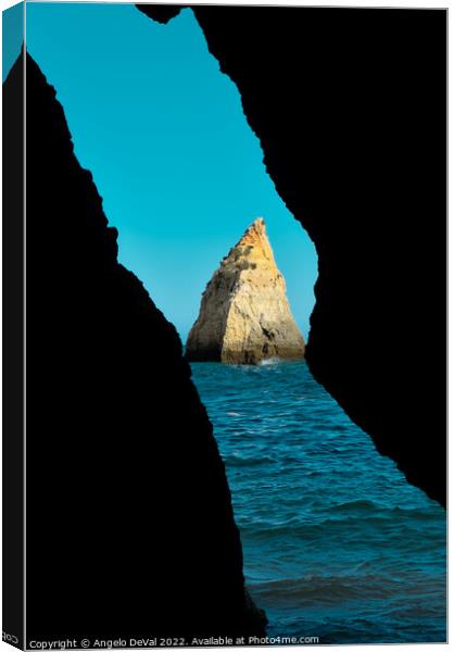Cave view at three brothers beach in Algarve, Portugal Canvas Print by Angelo DeVal