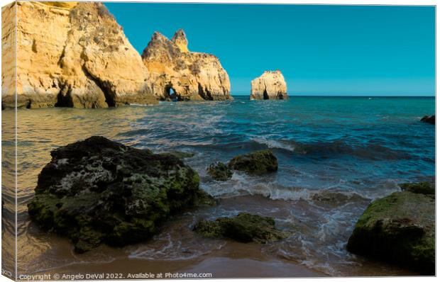 Rocks and Three Brothers Beach in Algarve Canvas Print by Angelo DeVal