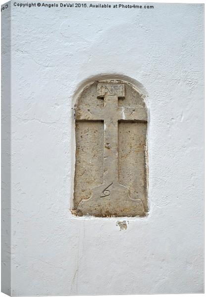 Church cross sculpted in stone  Canvas Print by Angelo DeVal