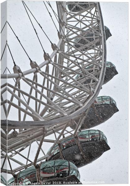 London Eye and Snow Canvas Print by Angelo DeVal