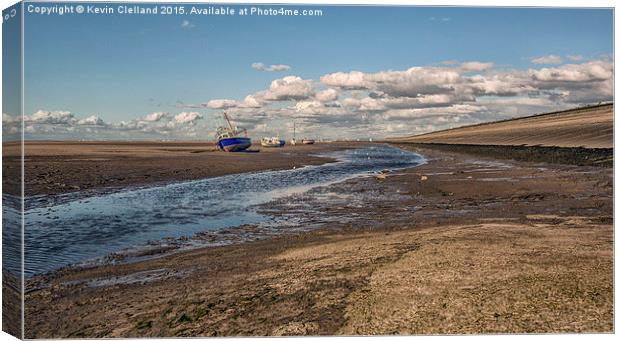 Fishing Boats at low tide Canvas Print by Kevin Clelland