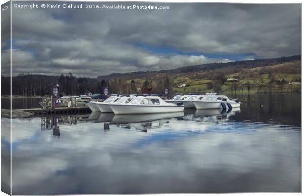 Boats anchored at Coniston Lake Canvas Print by Kevin Clelland