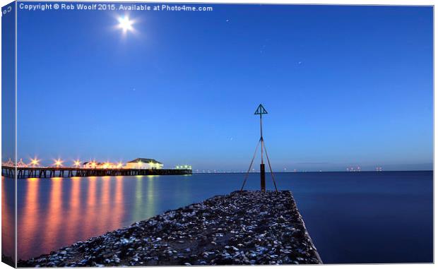  Clacton Pier reflections Canvas Print by Rob Woolf