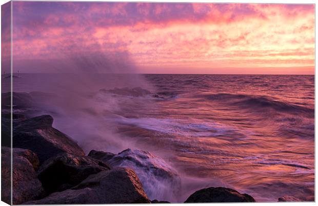 Sunrise and Waves Canvas Print by Rob Woolf