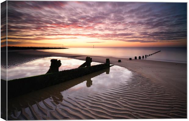 Walton on the Naze Sunrise Canvas Print by Rob Woolf