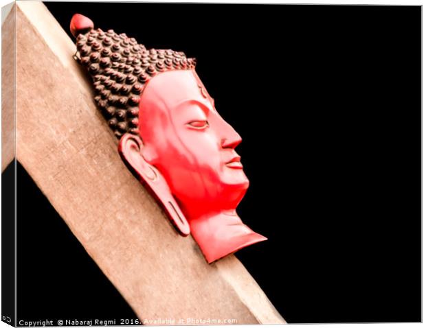 A head shot of hand made buddha on a wood in Kathm Canvas Print by Nabaraj Regmi