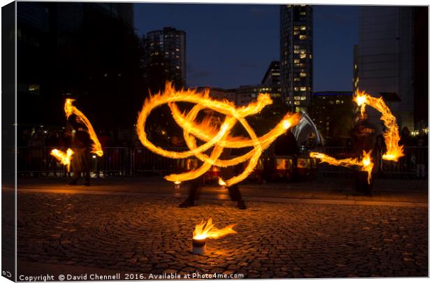 Fire Spinning  Canvas Print by David Chennell