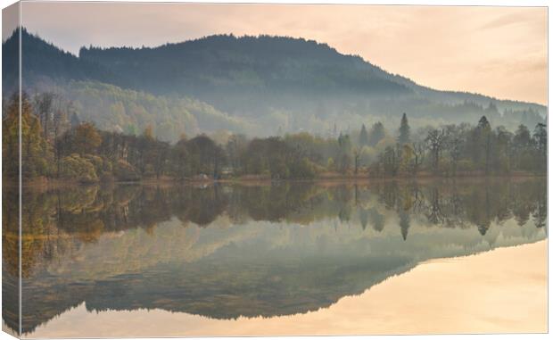 Spring reflections over Loch Achray Canvas Print by Miles Gray