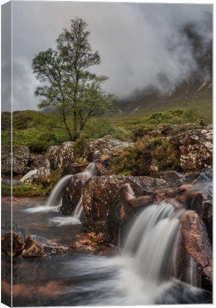 Waterfall in moody Glencoe Canvas Print by Miles Gray