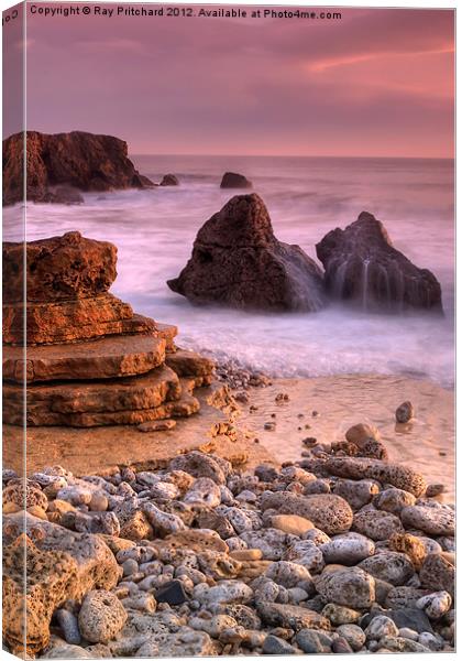 Waves over Rocks Canvas Print by Ray Pritchard